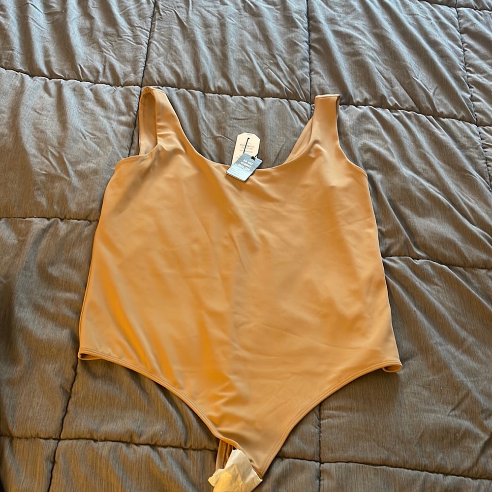 Contour body suit